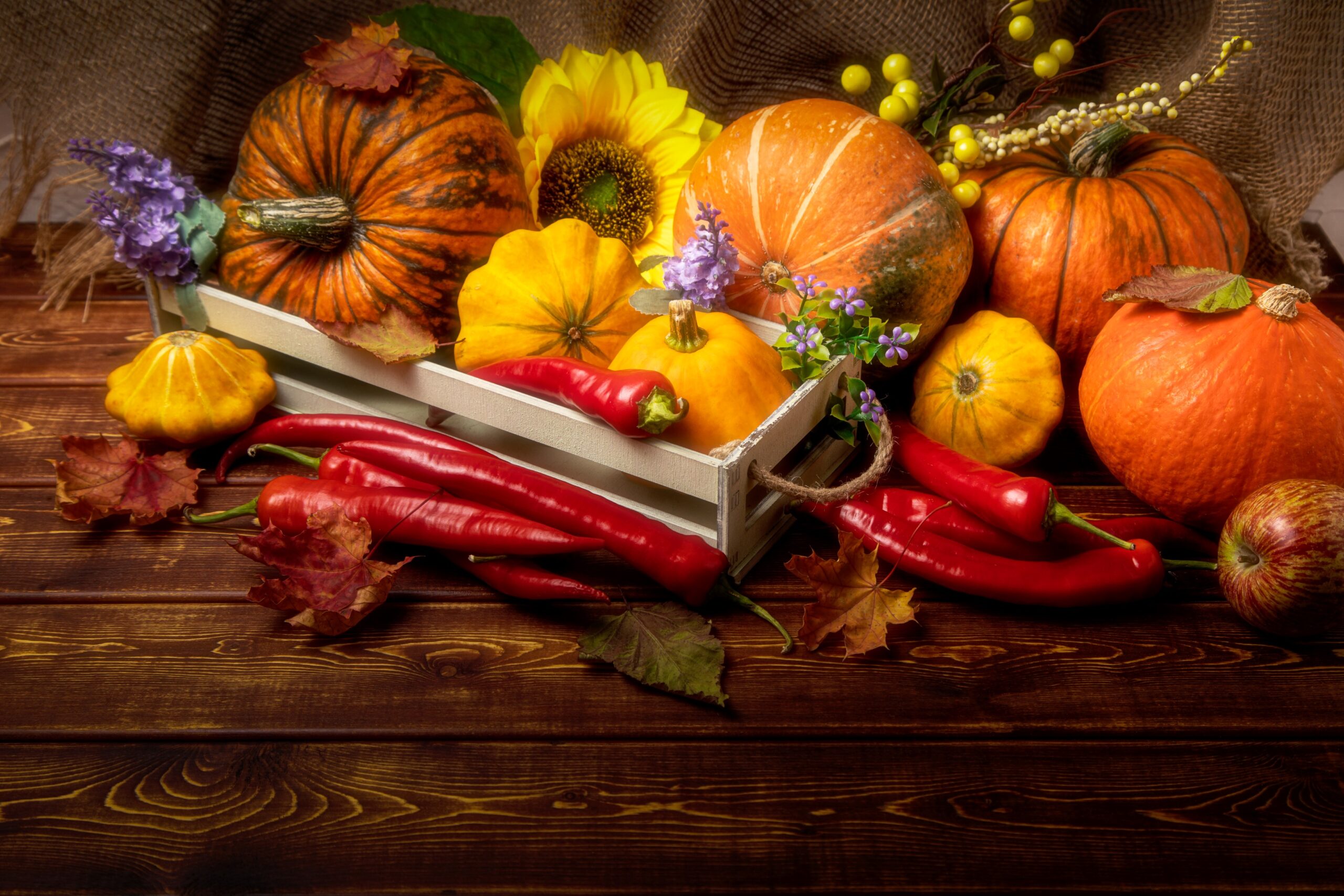 Pumpkins, flowers, and rustic vibes all to bring that Thanksgiving feeling.